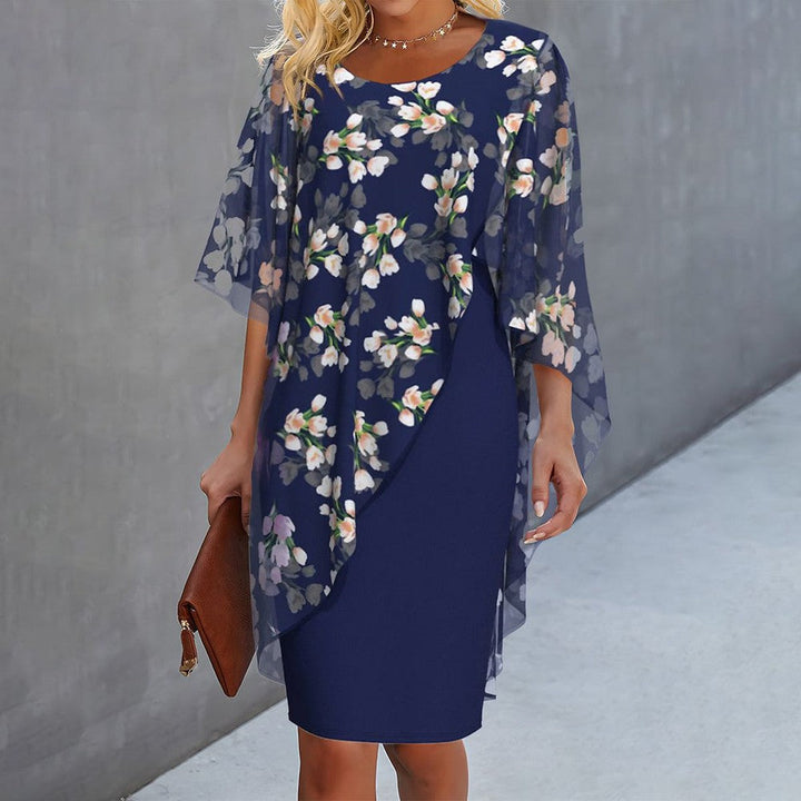 Bettina™ - Elegant Klänning med Blommigt Tryck